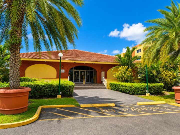 Property Photo:  6980 NW 186th Street 3-523A  FL 33015 