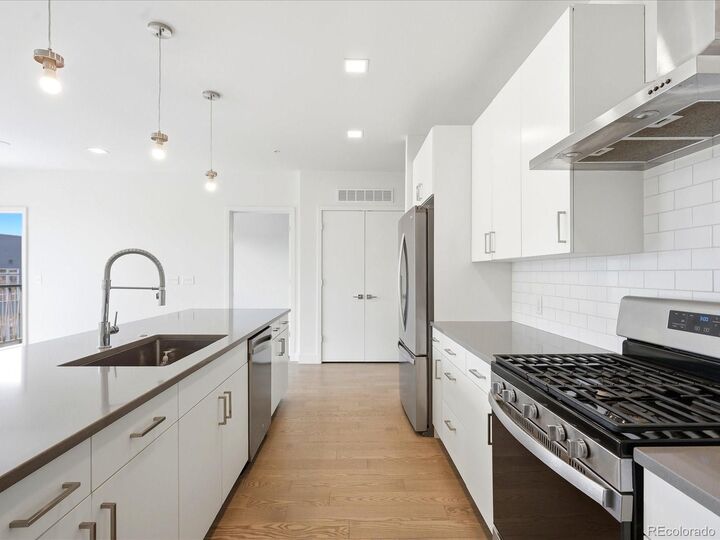 Property Photo: 1898 S Bannock Street 305 CO 80223