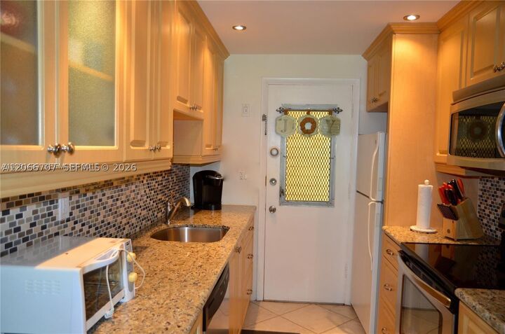 Property Photo:  17050 NE 14th Ave 115  FL 33162 