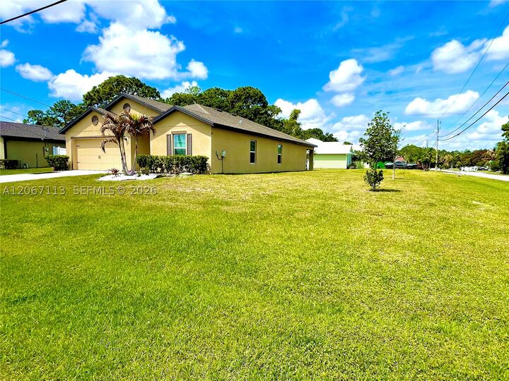 Property Photo:  3902 SW Brunswick St  FL 34953 