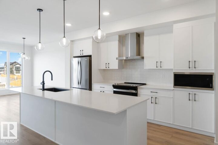 Property Photo:  19 Redbud Way  AB T8M 8G2 
