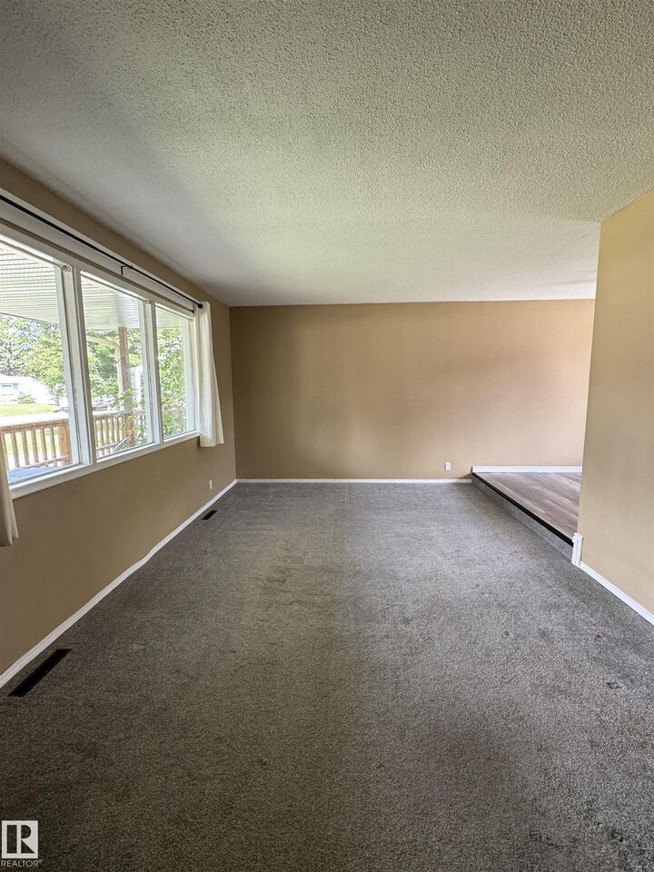 Property Photo: 4413 51 Street AB T9C 1A4