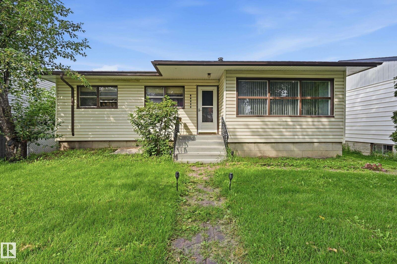 Property Photo: 11622 133 Street NW AB T5M 1H5