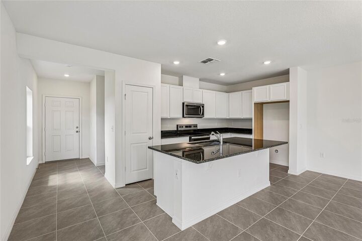 Property Photo: 679 Meadows Edge Place FL 33859