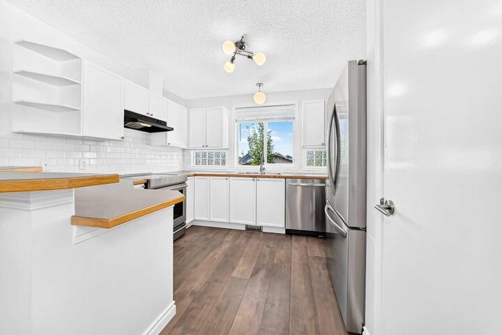 Property Photo: 708 Tuscany Drive NW AB T3L 3A7