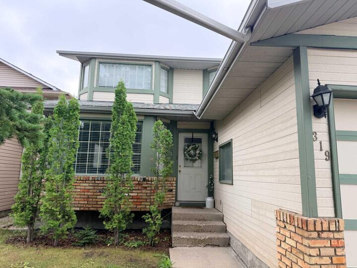 Property Photo: 319 Sunvale Drive SE AB T2X 3B8
