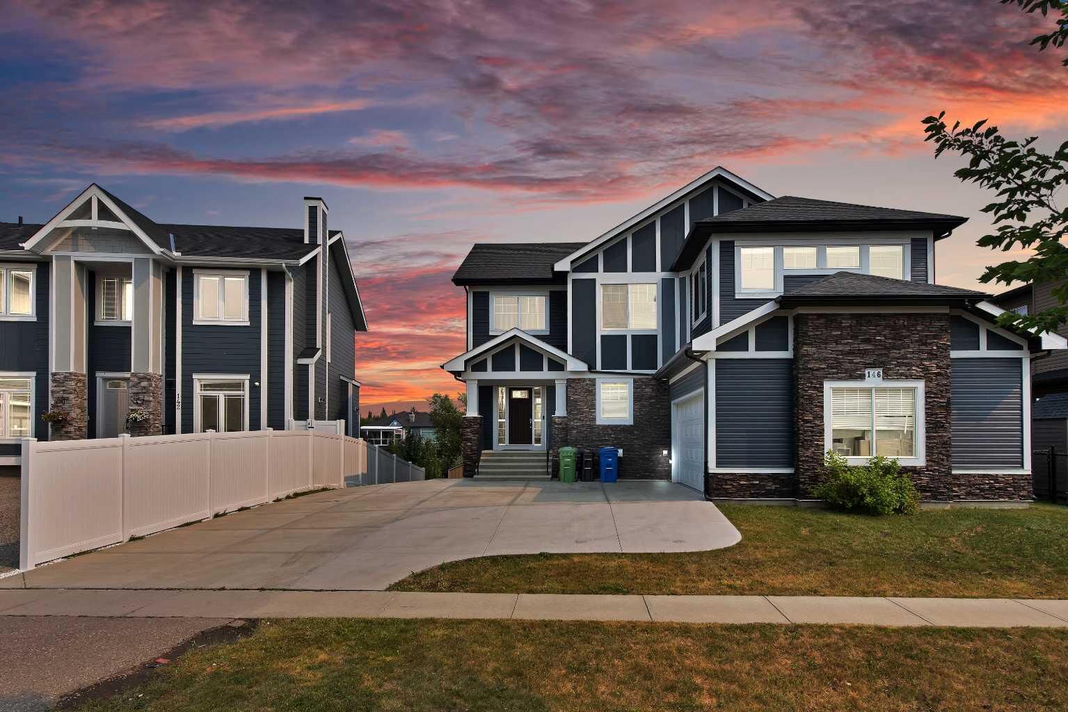 Property Photo: 146 Canoe Crescent SW AB T4B 2N9