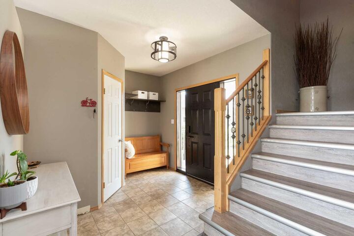 Property Photo: 242 Heritage Circle W AB T1K 7H8