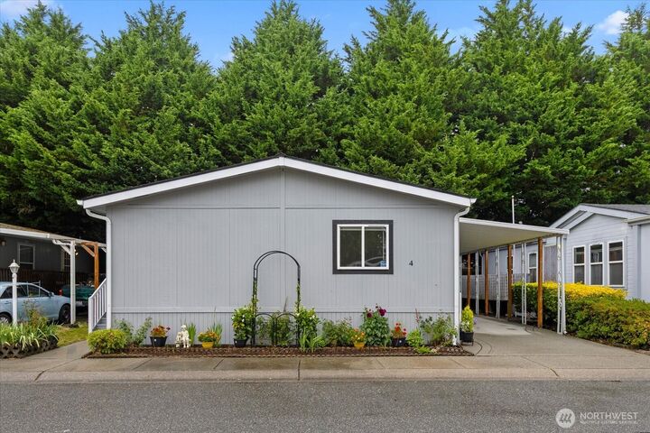 Property Photo:  11100  4th Avenue W 4  WA 98204 