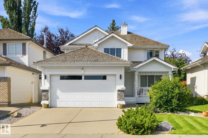 Property Photo: 1312 116 Street NW AB T6J 7B3