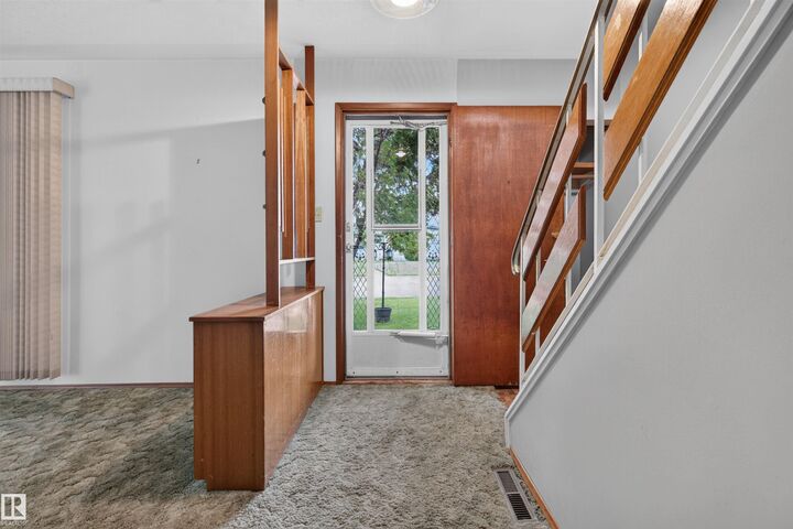 Property Photo: 4132 113 Street NW AB T6J 1L1