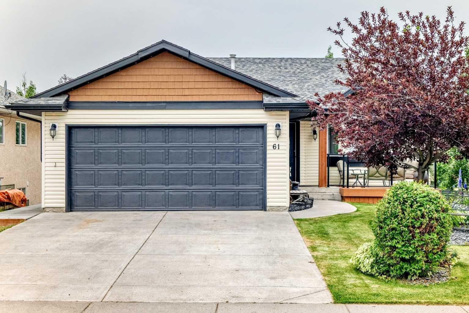 Property Photo: 61 West Edge Road AB T4C 1M7