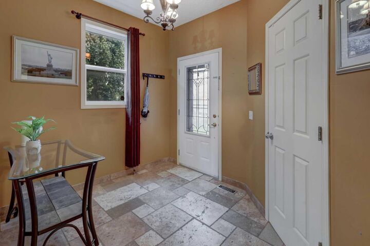 Property Photo: 66 Copperfield Close SE AB T2Z 4L2