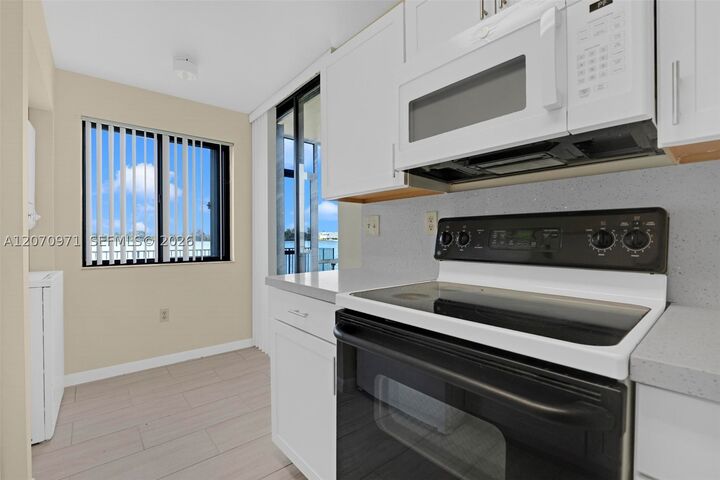 Property Photo:  15545 N Miami Lakeway N 106  FL 33014 