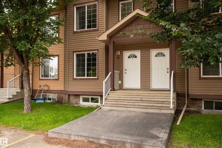 Property Photo: 320 Spruce Ridge Road 12 AB T7X 0H5