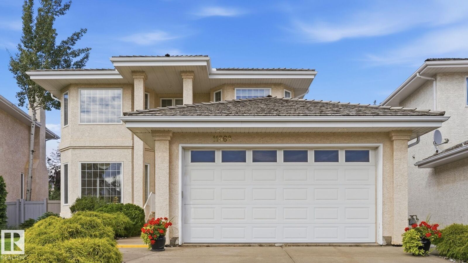 Property Photo:  11568 15 Avenue NW  AB T6J 7C9 