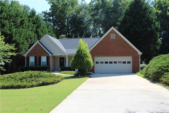 Property Photo:  7730 Timberline Ovlk  GA 30041 