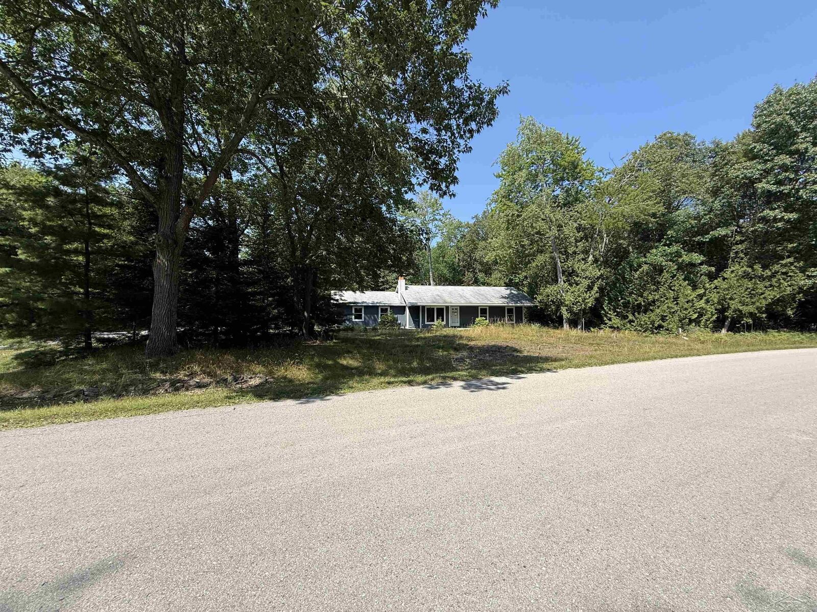Property Photo: 4879 Kingswood Lane MI 48750