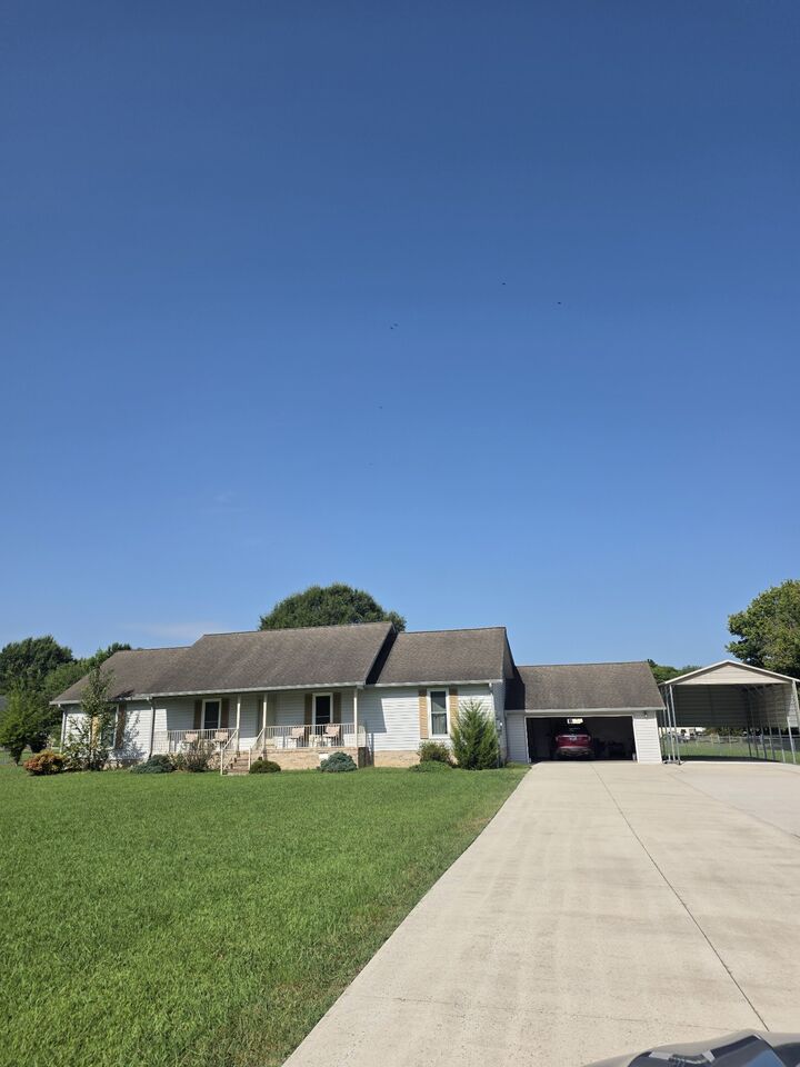 Property Photo:  205 Virginia Dr  TN 37388 