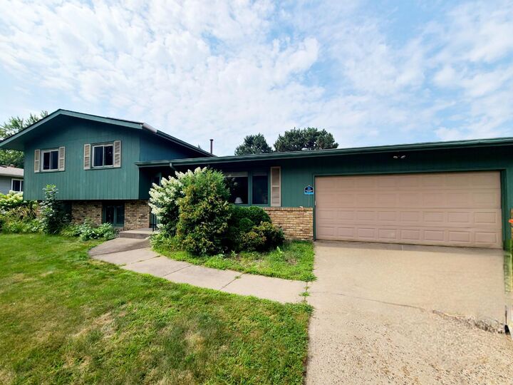 Property Photo:  8273 Scott Avenue N  MN 55443 