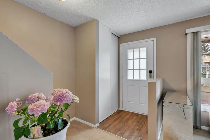 Property Photo: 174 Woodmont Terrace SW AB T2W 4Z4