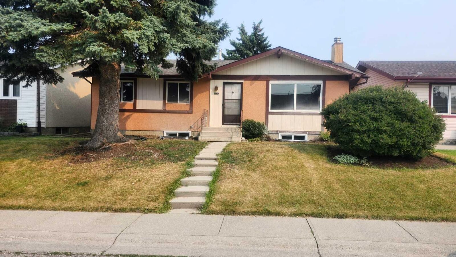 Property Photo:  6736 Malvern Road NE  AB T2A 5C4 