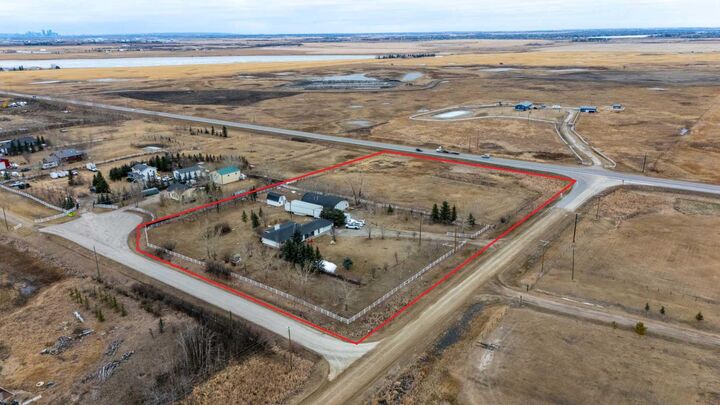 Property Photo: 233239 Glenmore View Road AB T1X 0H3
