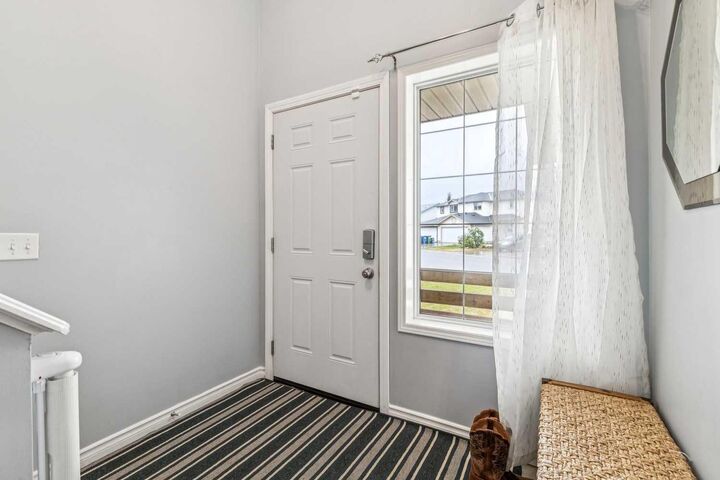 Property Photo: 116 Quigley Close AB T4C 1S4