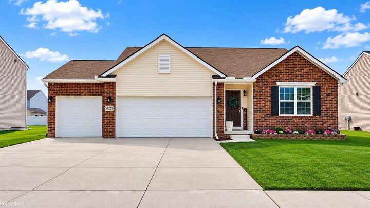Property Photo:  58221 River Oaks Drive  MI 48048 
