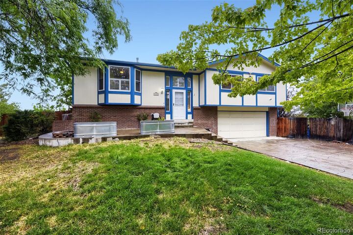 Property Photo:  7533 W Ottawa Place  CO 80128 