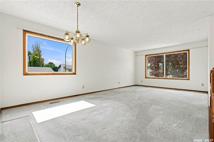 Property Photo: 202 Stacey Court SK S7L 7A7