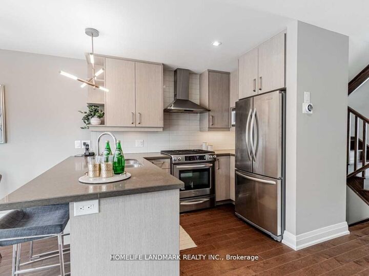 Property Photo:  158B Glebemount Avenue  ON M4C 3S7 