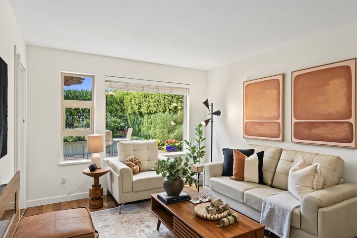 Property Photo:  1677 Lloyd Avenue 210  BC V7P 0B1 