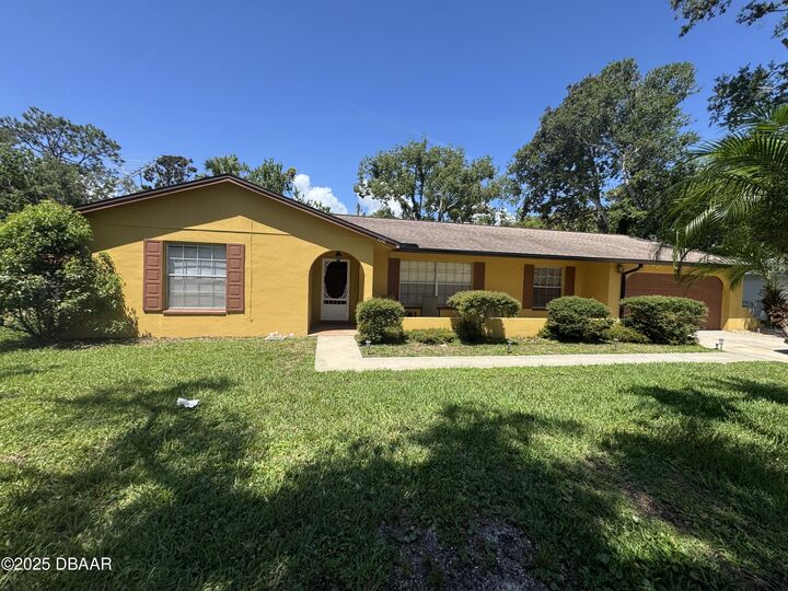 Property Photo:  730 Lindenwood Circle E  FL 32174 