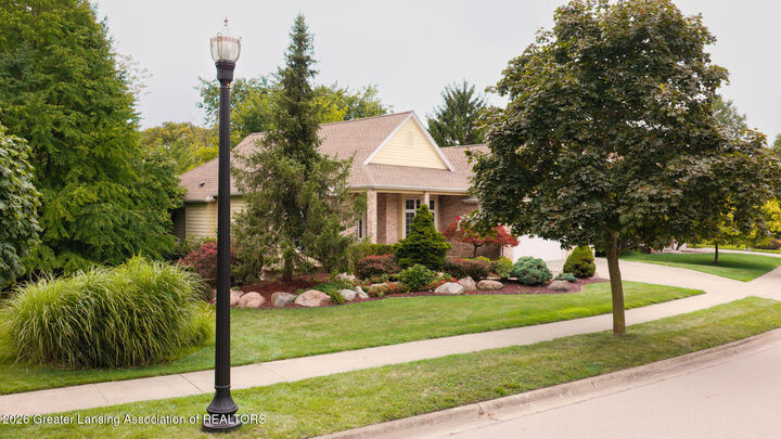 Property Photo:  5601 Wild Iris Lane  MI 48840 