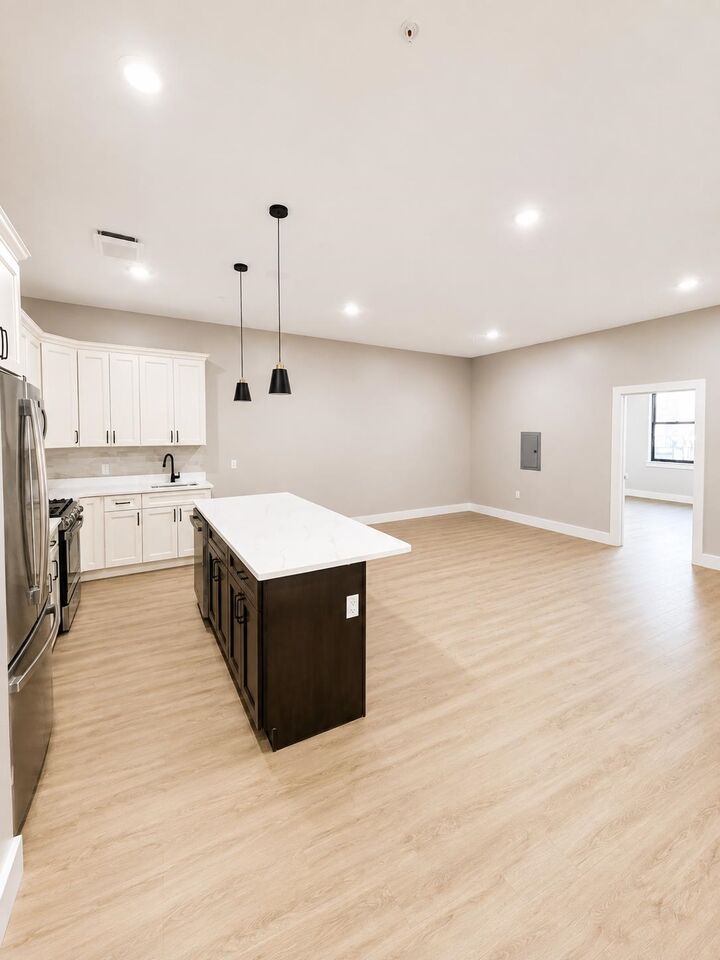 Property Photo:  6121 Bergenline Ave 202  NJ 07093 