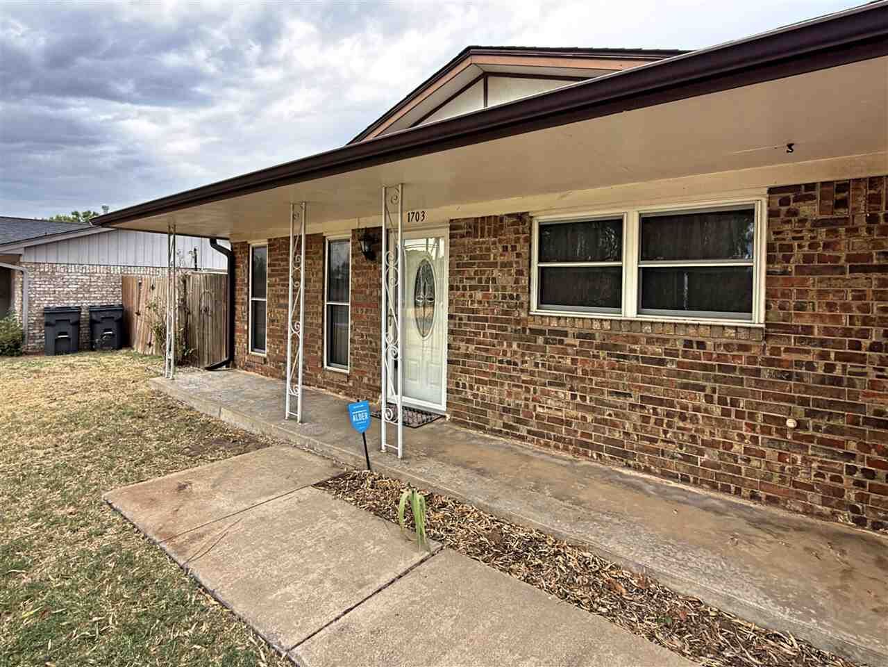 Property Photo: 1703 SE 47th St OK 73501-8313
