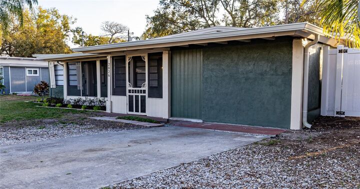 Property Photo:  2026 Sunset Lane  FL 34711 