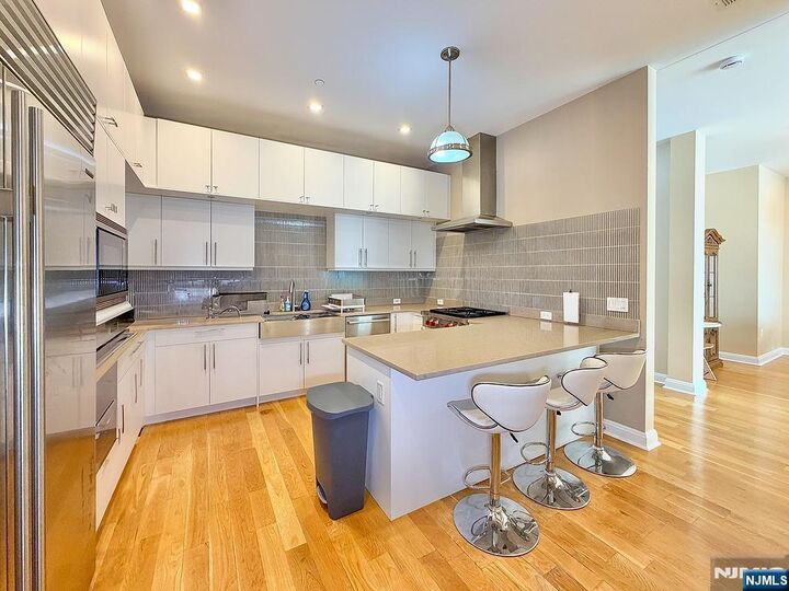 Property Photo:  9 Somerset Lane Ph 608/614  NJ 07020 