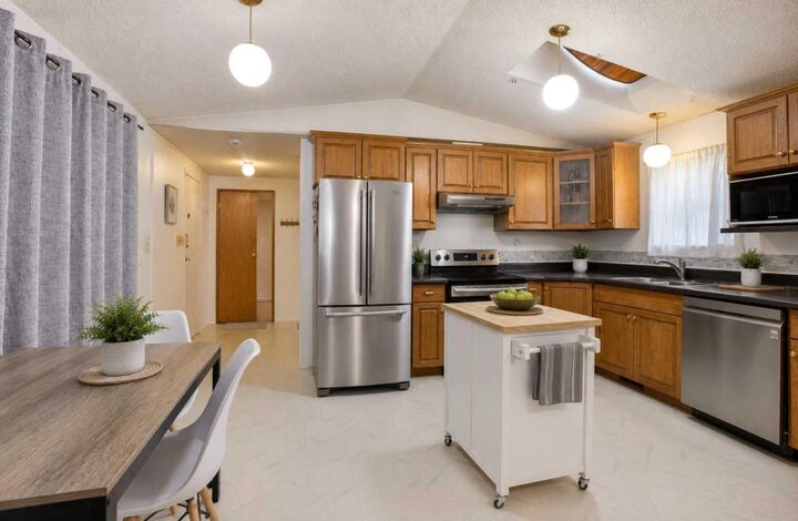 Property Photo:  209 Yardmaster Avenue  AB T1M 1P5 