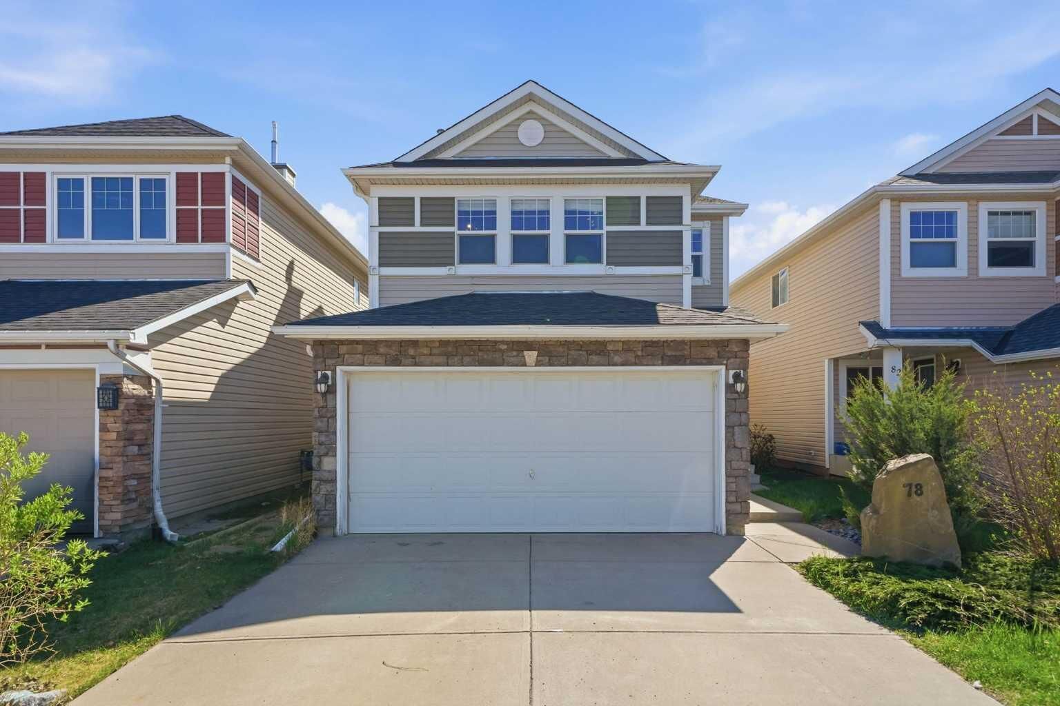 Property Photo: 78 Cougar Plateau Way SW AB T3H 5S4