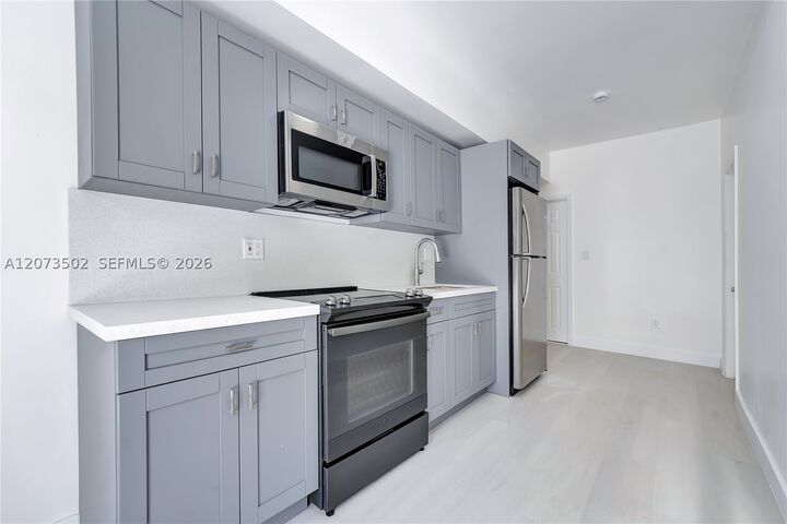 Property Photo: 769 NW 10th St 1 FL 33136