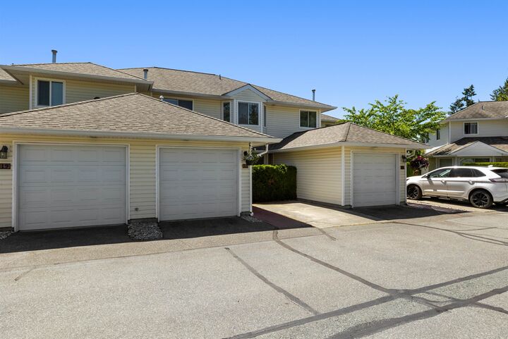 Property Photo: 21928 48 Avenue 18 BC V3A 8H1
