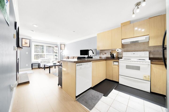 Property Photo:  8115 121A Street 210  BC V3W 1J2 