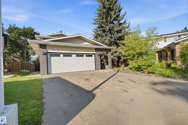 Property Photo: 3432 Hill View Crescent NW AB T6L 1P5