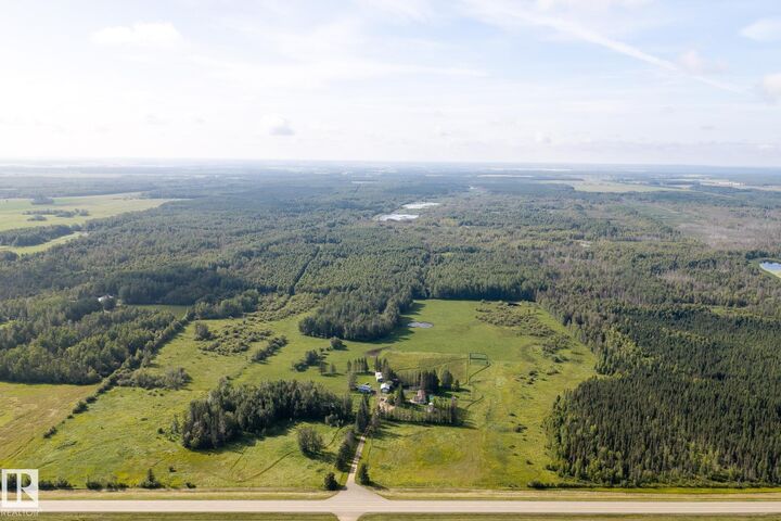 Property Photo:  214067 Hwy 55  AB T9S 1V7 