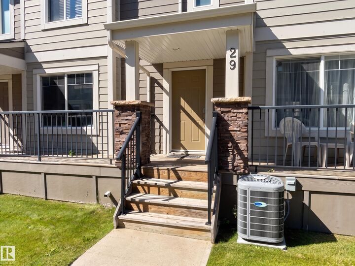 Property Photo: 1150 Windermere Way SW 29 AB T6W 2B6