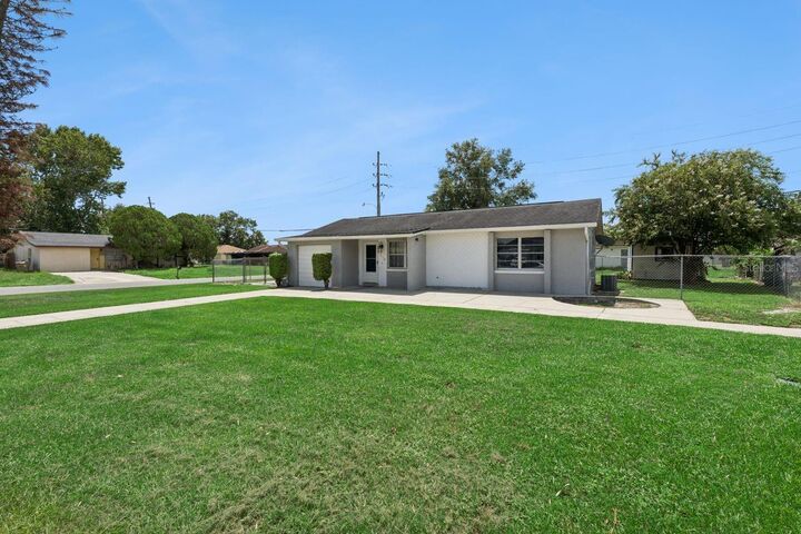 Property Photo:  110 Tangerine Court  FL 34743 