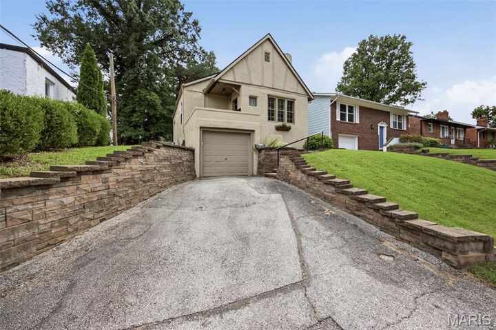 Property Photo:  8748 Pine Avenue  MO 63144 
