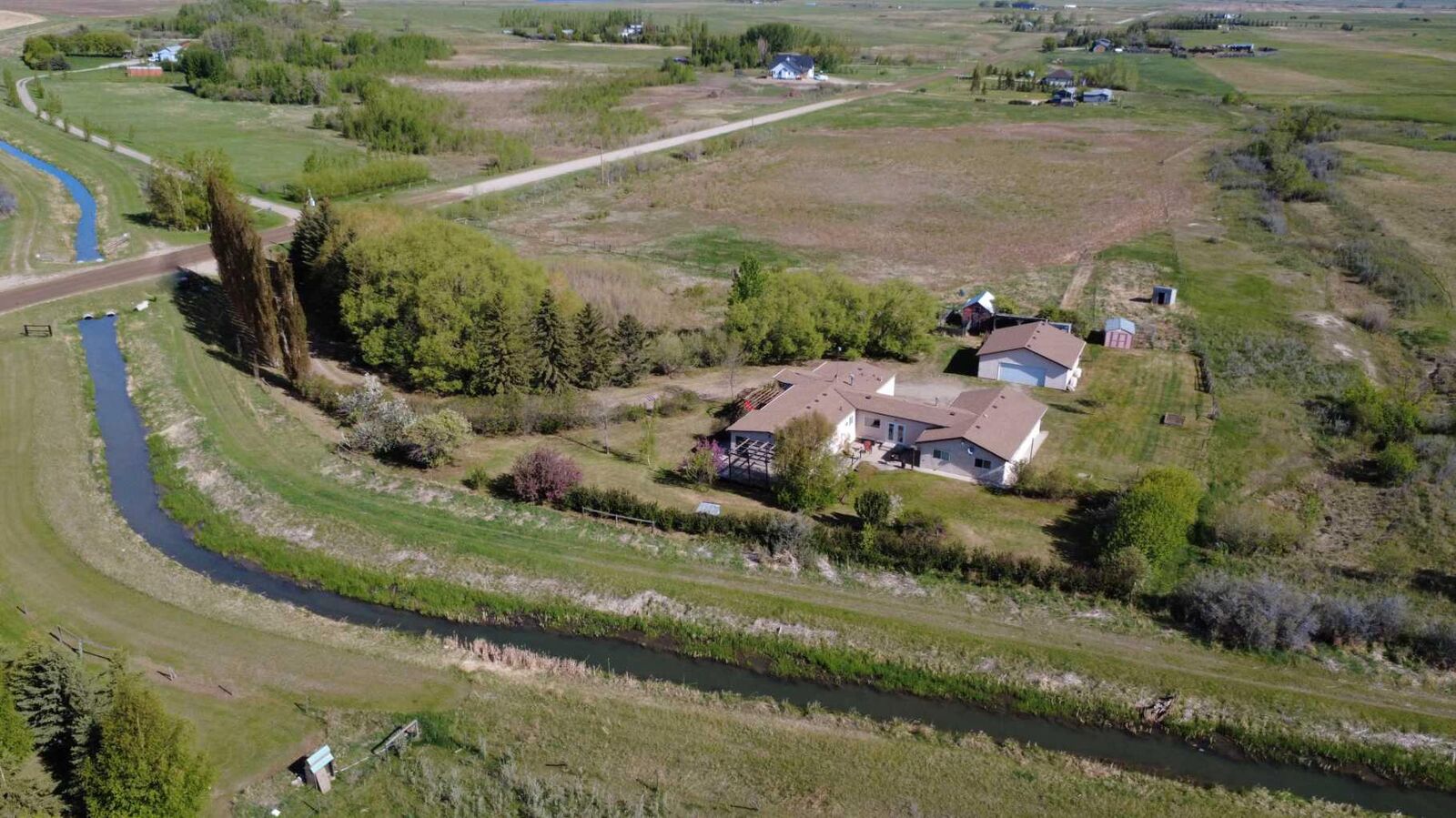 Property Photo: 244061 Range Road 251 AB T1P 0P1